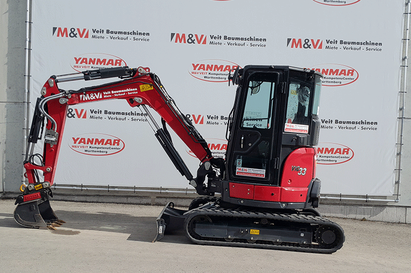 Seitenansicht des Yanmar Vio 33-6 Nullheckbaggers mit kurzem Heck, stabilem Fahrwerk und effizientem Ausleger