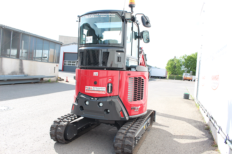 Rechte Seitenansicht des Yanmar Vio 33-7 Minibaggers 3,3 t – kompakte Bauweise, ausgewogene Proportionen und optimale Sicht auf Ausleger und Anbaugerät