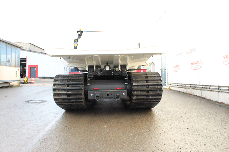 PowerBully 9D Kettendumper Heckansicht – stabile Bauweise, robuste Mulde und zuverlässige Technik für den Einsatz auf anspruchsvollen Baustellen